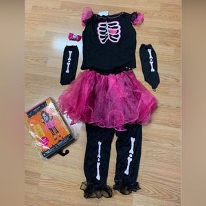 Brand new in bag. Girls Skelocutie Halloween costume. Purchased and never worn.